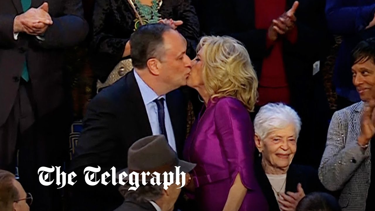 Jill Biden kisses Kamala Harris’ husband on the lips
